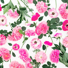 Pink rose flowers and pink petals isolated on white background. Flat lay, top view. Floral pattern