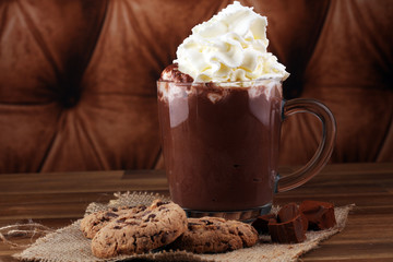 hot chocolate with cocoa and chocolate chip cookies.