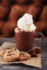 hot chocolate with cocoa and chocolate chip cookies.