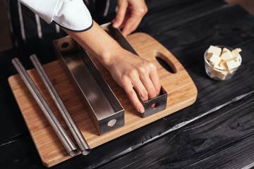 fill the dough in steel moulds
