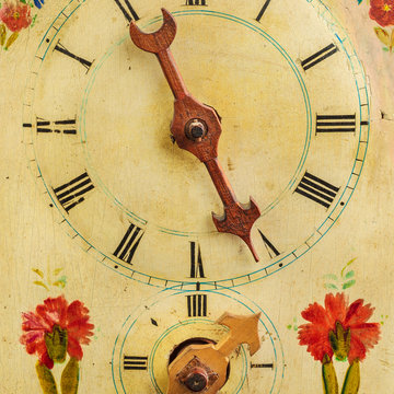 Clock with hand painted floral decoration