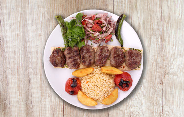 Meatballs plate potatoes bulgur and salad