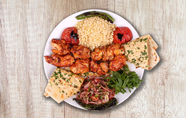 Chicken grilled with bulgur and pepper