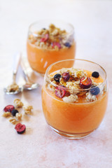 Melon smoothie with granola for light breakfast