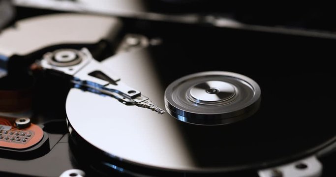 closeup of computer hard drive spinning