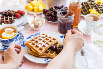 Table Set for Breakfast with Waffles and Berries