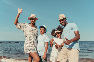 happy african american family on beach