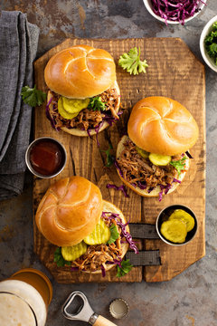 Pulled pork sandwiches with cabbage and pickles