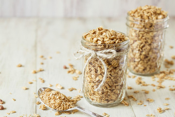 Close Up Almond Granola In Glass Jars