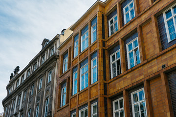 Fototapeta na wymiar orange and brown facaded buildings in a row