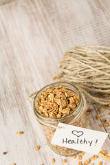 Almond Granola With Heart Healthy Tag On Jar From Above