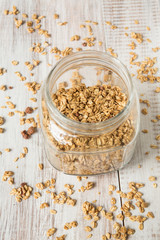 Almond Granola Breakfast Cereal In Glass Jar