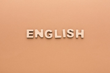 Word English on beige background
