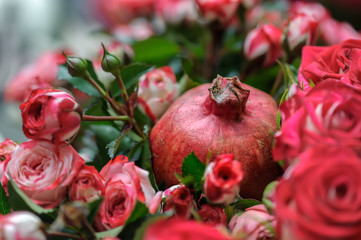 Roses and pomegranate