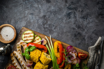 Barbeque sausages with vegetables