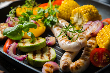 Barbeque sausages with vegetables