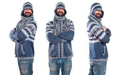 Set of Man with winter clothes with his arms crossed