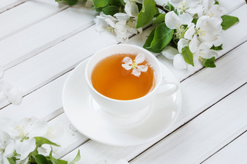 Green tea in white cup