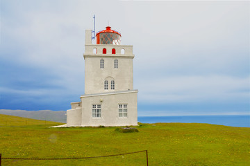 Fototapeta na wymiar Dyrholaey lighthouse tower, South coast of Iceland