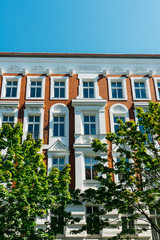 brick building with white ornaments