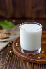 Soybean milk with soy beans around it