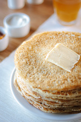 Stack or pile of pancakes at russian restaurant.