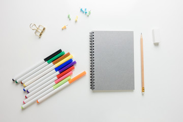 Minimal work space - Creative flat lay photo of workspace desk with sketchbook and wooden pencil on copy space white background. Top view , flat lay photography.