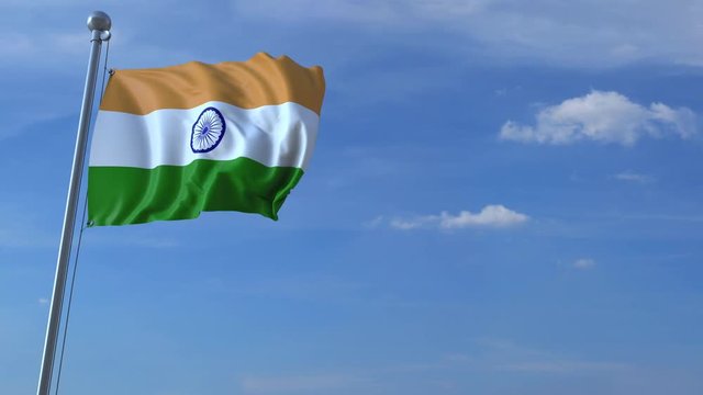Commercial airplane landing behind waving Indian flag. Travel to India conceptual animation