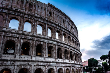 Fototapeta na wymiar Italian architecture of Rome. Atmospheric city. The legendary Colosseum. blood and Sand