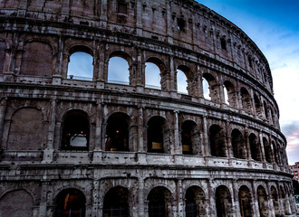 Fototapeta na wymiar Italian architecture of Rome. Atmospheric city. The legendary Colosseum. blood and Sand