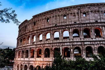 Fototapeta na wymiar Italian architecture of Rome. Atmospheric city. The legendary Colosseum. blood and Sand Evening Shooting