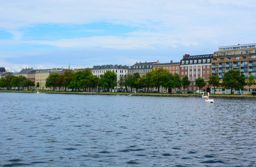 Fototapeta na wymiar Copenhagen cityscape and the Student Lake (Peblinge Sø), Denmark