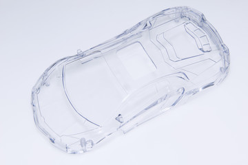 A transparent plastic toy car