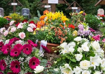 flowers on a grave at the cemetery