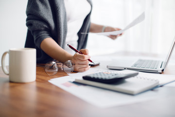 woman working on laptop in the office