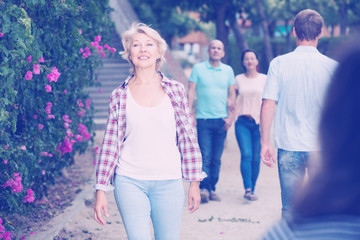  woman walking in the park at leisure