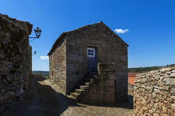 Fototapeta na wymiar Traditional house made of stone in the historic village of Castelo Mendo, in Portugal; Concept for travel in Portugal