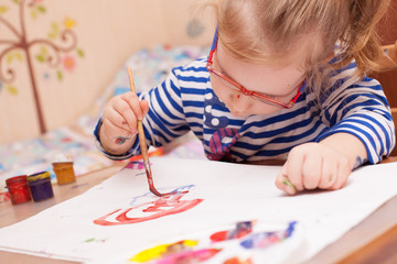 girl sitting at the table