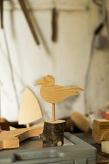 wooden seagull in a factory