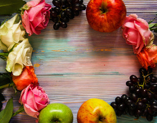 Wreath made of roses, grapes and apples