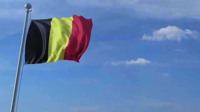Commercial airplane landing behind waving Belgian flag. Travel to Belgium conceptual animation