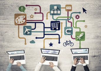 Top view of businesspeople sitting at table and using gadgets