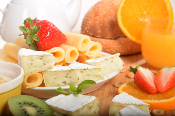 White and yellow cheese with green pepper