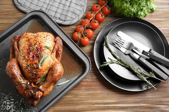 Delicious golden turkey on baking sheet