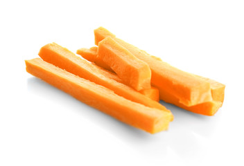 Heap of fresh carrot slices on white background