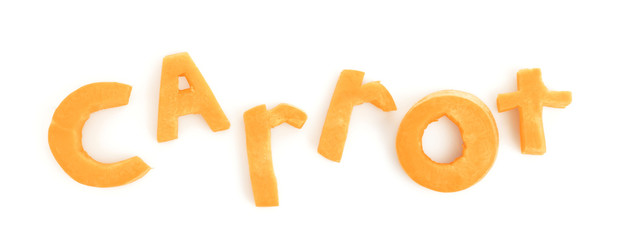 Word carrot made from fresh vegetable on white background