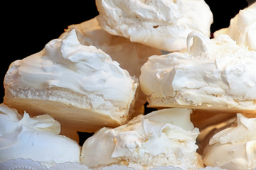 close up of meringue cookie stack in bakery