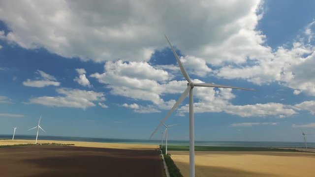 Wind generator converts the energy on the shore of the sea. Aerial survey