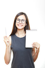 Smiling business woman holding pads of notepaper on white background