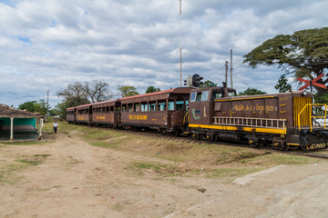 IZNAGA, CUBA - FEB 9, 2016: Local train in Iznaga village in Valle de los Ingenios valley near Trinidad, Cuba